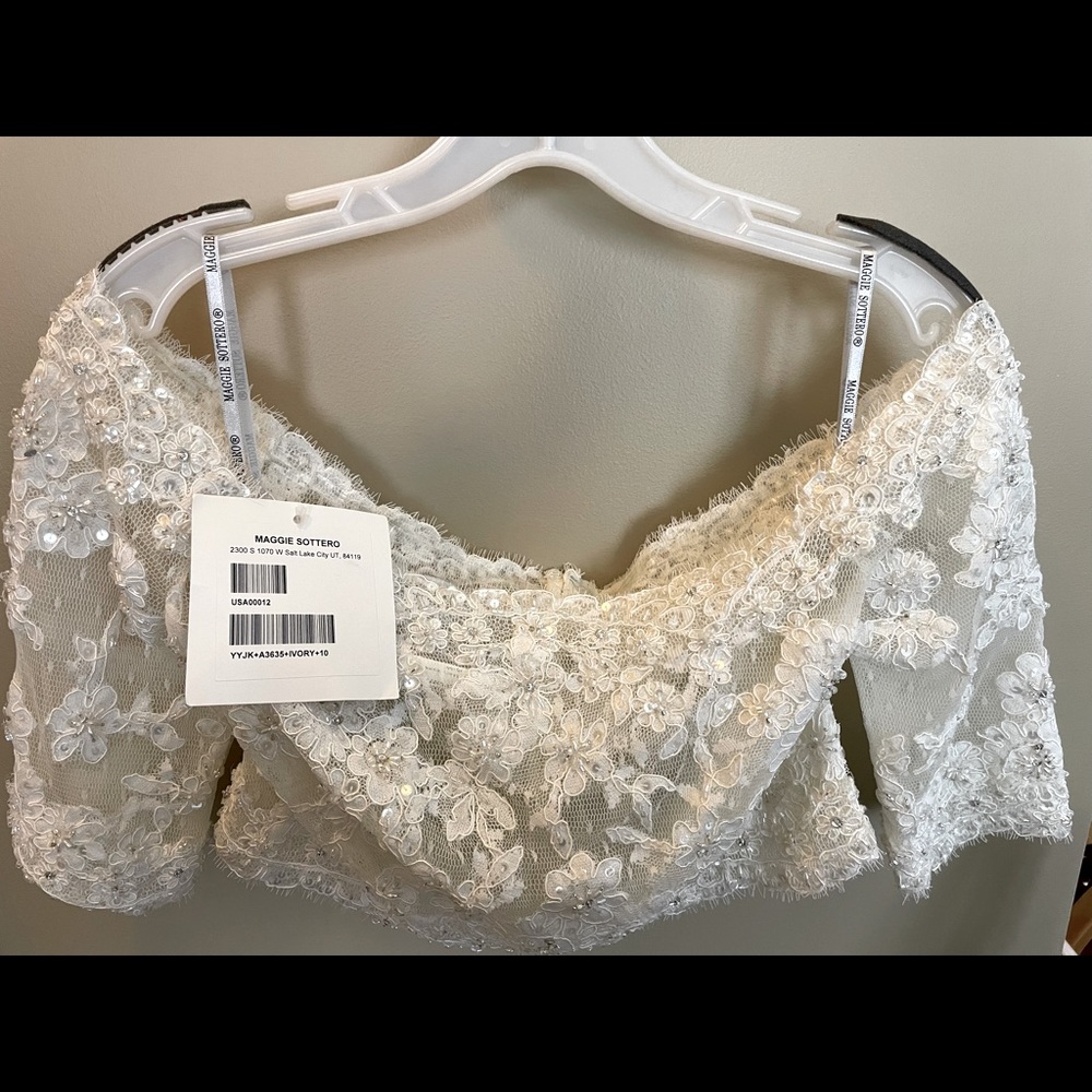 Maggie Sottero lace bridal jacket, ivory, size 10, new with tags.